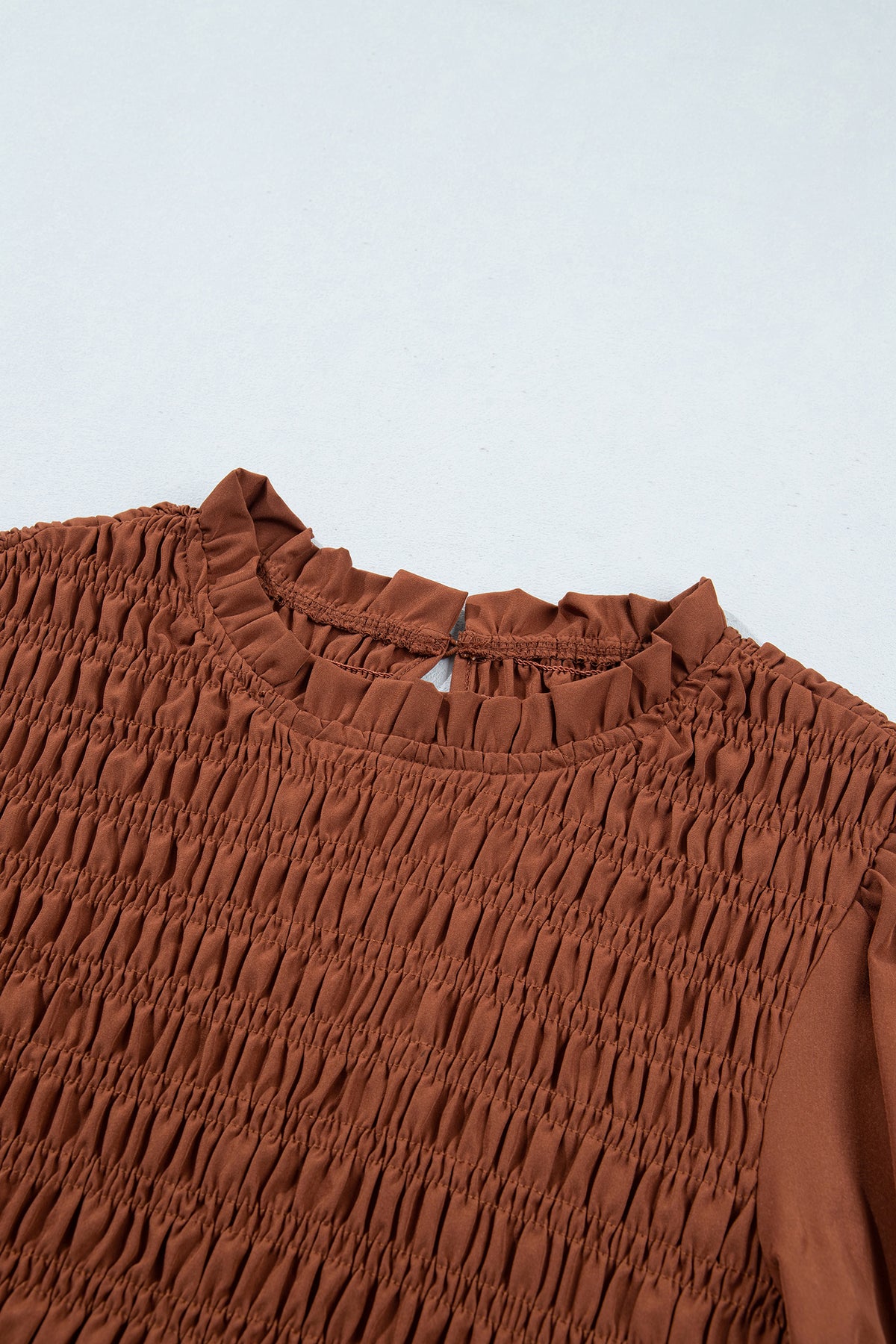 Jet Stream Solid Color Smocked Ruffle Hem Long Sleeve Blouse